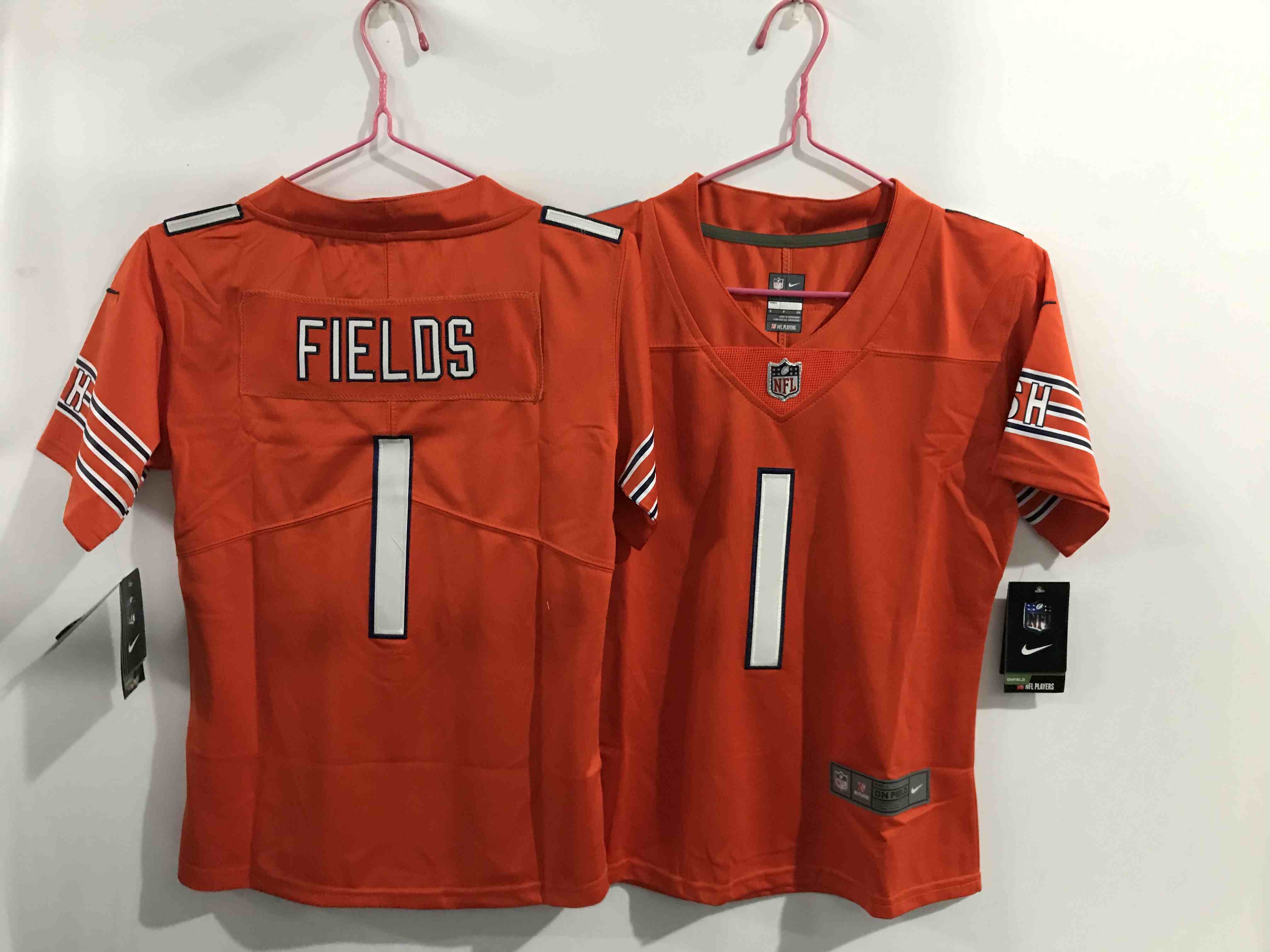 Women's Nike Bears 1 Justin Fields Orange Vapo Limited Jersey
