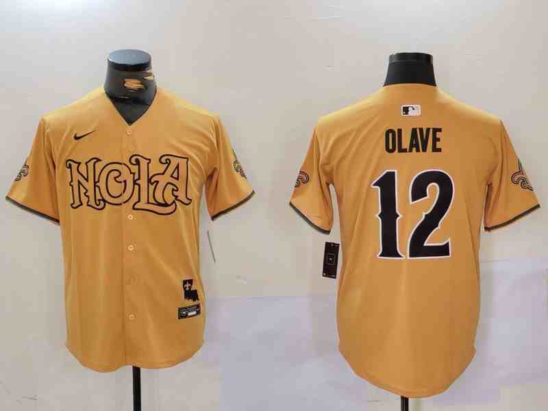 Men's New Orleans Saints #12 Chris Olave Number Gold Nola Button Jersey